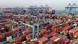 Aerial view of shipping containers sitting stacked at Asia's first fully automated container terminal of Qingdao Port in the Qingdao Area of China Aerial view of shipping containers sitting stacked at Asia's first fully automated container terminal of Qingdao Port in the Qingdao Area of China