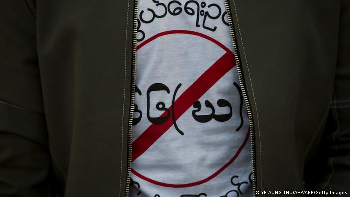 An activist wears a T-shirt denouncing Myanmar's controversial sweeping telecommunications law