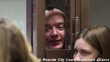 ARCHIV 18.03.2021 In this handout video grab released by the press service of Moscow City Court, Ivan Safronov, an ex-journalist and an aide to the head of Russia's space agency Roscosmos, detained on suspicion of treason, and his fiancee Ksenia Mironova are pictured during a hearing on the appeal against the extension of Safronov's arrest till May 7, at Moscow City Court, in Moscow, Russia. Safronov is suspected of handling classified information about Russia's defense sector to a special service of a NATO country. Editorial use only, no archive, no commercial use. Moscow City Court