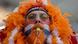 Niederländischer Fans in Orange, mit Nationalfarben im Gesicht bemalt, Pfeife im Mund. Foto: AP Niederländischer Fans in Orange, mit Nationalfarben im Gesicht bemalt, Pfeife im Mund. Foto: AP