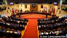 01.05.2021
Representatives participate in a session to discuss the removal of Supreme Court judges at the Salvadoran congress, in San Salvador, El Salvador, May 1, 2021. REUTERS/Jose Cabezas