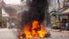 Motorcycles are being burnt as protesters take part in a demonstration against the military coup in Myanmar Motorcycles are being burnt as protesters take part in a demonstration against the military coup in Myanmar