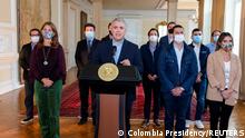 Colombia's President Ivan Duque speaks during a televised address announcing the withdrawal of the tax reform bill, in Bogota, Colombia May 2, 2021. Colombia Presidency/Handout via REUTERS NO RESALES. NO ARCHIVES ATTENTION EDITORS - THIS IMAGE HAS BEEN SUPPLIED BY A THIRD PARTY.