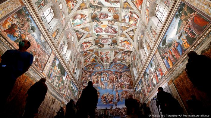 Visitors admire the Sistine Chapel inside the Vatican Museums.