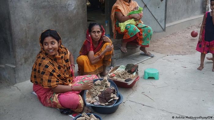 Women roll beedis in Lalgola village in West Bengal