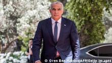 5.5.2021, Jerusalem, Israel, Yair Lapid, leader of the Yesh Atid (There Is a Future) party, arrives at the Israeli President's residence in Jerusalem on May 5, 2021. - - Israel OUT (Photo by OREN BEN HAKOON / AFP) / Israel OUT (Photo by OREN BEN HAKOON/AFP via Getty Images)