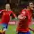 David Villa, djathtas, dhe Andres Iniesta nga Kombëtarja spanjolle të gëzuar për kualifikimin