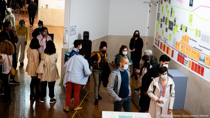 Visitors wearing masks attend the inaugural exhibition of the Serralves Museum of Contemporary Art.