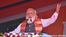 Indian Prime Minister Narendra Modi addresses after laying Â foundation stone of two medical colleges and launching the scheme for the upgradation of the state highways, at Dhekiajuli in Sonitpur district of Assam , India Sunday, Feb. 7, 2021 (Photo by Anuwar Hazarika/NurPhoto)