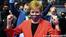 Scotland's First Minister and leader of the Scottish National Party (SNP), Nicola Sturgeon reacts after being declared the winner of the Glasgow Southside seat at Glasgow counting centre in the Emirates Arena in Glasgow on May 7, 2021, during counting for the Scottish parliament elections. (Photo by Andy Buchanan / AFP)