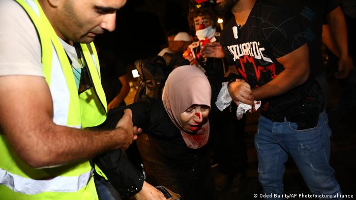 Mujer herida en Jerusalén.