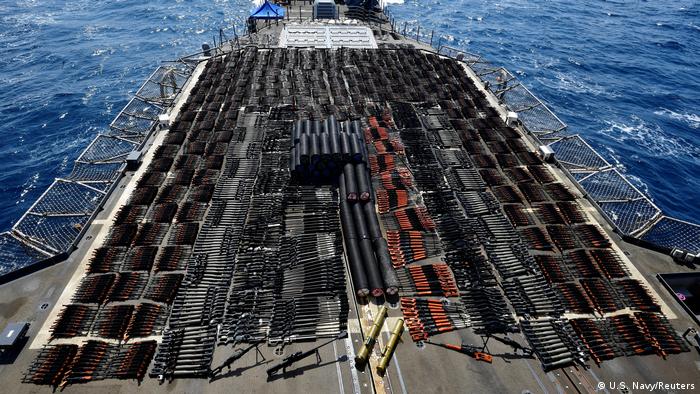 Thousands of illicit weapons are displayed onboard the guided-missile cruiser USS Monterey 