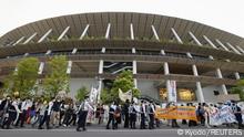 09.05.2021
People protest against holding the Tokyo 2020 Olympics amid the coronavirus disease (COVID-19) outbreak, around Olympic Stadium (National Stadium) as an Olympic test event for athletics is held inside the venue in Tokyo, Japan May 9, 2021, in this photo taken by Kyodo. Kyodo/via REUTERS ATTENTION EDITORS - THIS IMAGE WAS PROVIDED BY A THIRD PARTY. MANDATORY CREDIT. JAPAN OUT. NO COMMERCIAL OR EDITORIAL SALES IN JAPAN