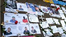 Nur zur abgesprochenen Berichterstattung! **** Print-outs of the victims of police violence in Colombia. Demonstration in Düsseldorf. - Credit:   Diana Chiquinquirá 