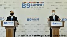 (210511) -- BUCHAREST, May 11, 2021 (Xinhua) -- Romania's President Klaus Iohannis (R) and Polish President Andrzej Duda hold a press conference after the virtual Summit of the Bucharest Nine (B9) format in Bucharest, Romania, May 10, 2021. The virtual Summit of the Bucharest Nine (B9) format closed late Monday with a joint declaration, expressing the expectation and support of the participating countries for the upcoming NATO Summit to take substantive and forward-looking decisions to strengthen the alliance's deterrence and defense architecture. (Romanian Presidency/Handout via Xinhua)
