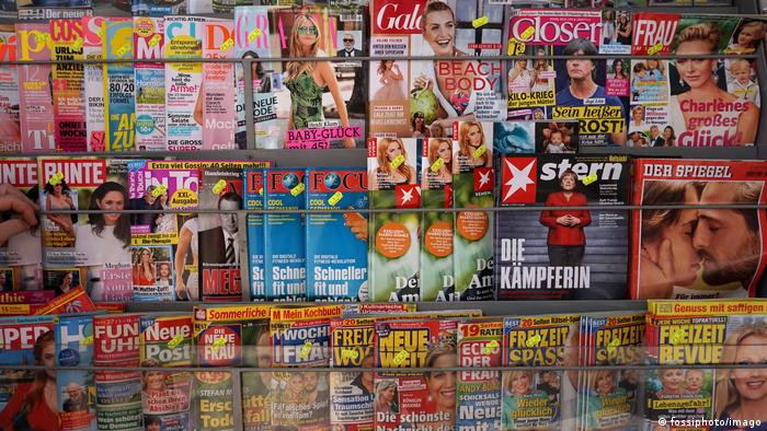 a newsstand with German magazines