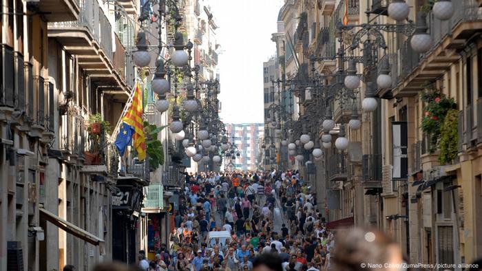 Crowds fill Las Ramblas, the main boulevard in Barcelona Crowds fill Las Ramblas, the main boulevard in Barcelona