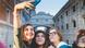 Three young women take a selfie in front of the Bridge of Sighs in Venice Three young women take a selfie in front of the Bridge of Sighs in Venice