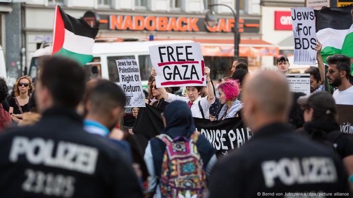 Pro-Palestinian demonstrators protesting against Israel's actions at the border with the Gaza strip on the Hermannplatz square in Berlin's Neukoelln district