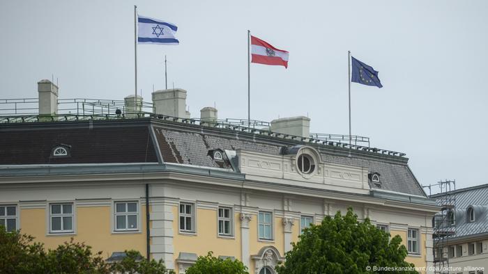 The Israeli flag can be seen on Austria's chancellory building