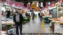 May 14, 2021, Bolton, Greater Manchester, England: Bolton, UK. Shoppers wear face mask at Bolton Market on Friday morning. Bolton now has the highest infection rate in Britain at 192.3 cases per 100,000. (Credit Image: Â© Adam Vaughan/London News Pictures via ZUMA Wire