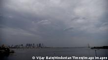 MUMBAI, INDIA - MAY 16: Dark clouds hover over the citys skyline as Cyclone Tauktae approches to Mumbai seen from Bandra Reclamation on May 16, 2021 in Mumbai, India. The influence of the storm in Maharashtra is likely to subside after May 17 Monday as it would travel northwestwards towards Gujarat around May 18, said an official with IMDs regional forecasting centre in Mumbai. The official added the storm will not meet directly with the coast in Maharashtra, and that it may also delay the arrival of the monsoon along Indias west coast by a few days. Photo by Vijay Bate/Hindustan Times Maharashtra Braces For Cyclone Tauktae PUBLICATIONxNOTxINxIND
