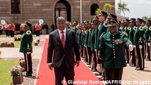 Angolan President Joao Lourenco (L) reviews the Guard of Honor upon his arrival at Union Buildings during the Angolan President state visit on November 24, 2017 in Pretoria. (Photo by GIANLUIGI GUERCIA / AFP) (Photo by GIANLUIGI GUERCIA/AFP via Getty Images)
