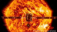 This illustration made available by NASA depicts the Solar Orbiter satellite in front of the Sun. On Sunday, Feb. 9, 2020, NASA and the European Space Agency have planned to launch the spacecraft on a mission to the sun to get close-up views of its polar regions. (ESA/ATG medialab, NASA/SDO/P. Testa (CfA) via AP)