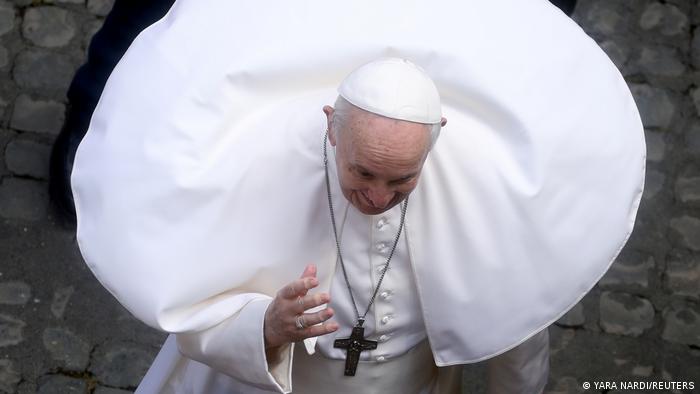 Pope Francis caught in a gust
