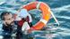 Spanish police officer Juan Francisco rescues baby at sea Spanish police officer Juan Francisco rescues baby at sea