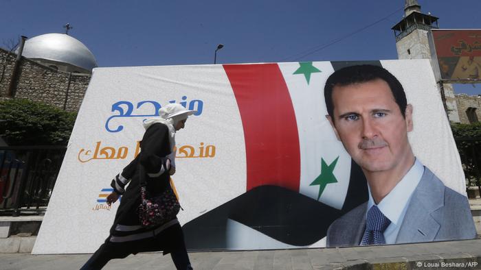 Afiche de campaña del presidente sirio, Bashar Al Assad, en Damasco.