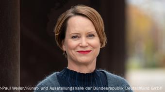 A photograph of Eva Kraus, director-general at the Art and Exhibition Hall of the Federal Republic of Germany in Bonn