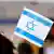 Steag israelian la o manifestație pro-israeliană desfășurată joi la Berlin