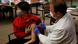 A US teenager getting vaccinated A US teenager getting vaccinated