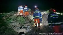 (210523) -- JINGTAI, May 23, 2022 (Xinhua) -- Rescuers search for missing people at the Yellow River Stone Forest tourist site in Jingtai County of Baiyin City, northwest China
