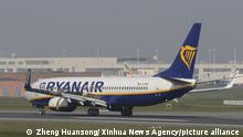 (210419) -- BRUSSELS, April 19, 2021 (Xinhua) -- A Ryanair flight (front) lands while a Brussels airlines flight takes off at the Brussels Airport in Zaventem, Belgium, April 19, 2021. Belgium on Monday ended its ban on non-essential travel within the European Union (EU). (Xinhua/Zheng Huansong)