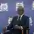 Bénin: Patrice Athanase Guillaume Talon assis sur un siège lors de sa seconde investiture, en mai 2021