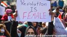Iraqi women raise placards as they take part in an anti-government demonstration in the capital Baghdad's Tahrir Square on February 13, 2020. - More than 540 Iraqis have been killed in protest-related violence accross Iraq since the rallies erupted, according to a recent toll by the Iraqi Human Rights Commission. (Photo by AHMAD AL-RUBAYE / AFP) (Photo by AHMAD AL-RUBAYE/AFP via Getty Images)