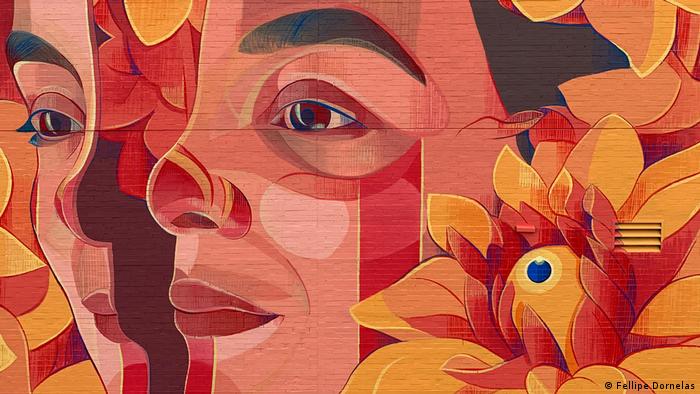 Mural de la artista Gleo con rostros de mujeres.