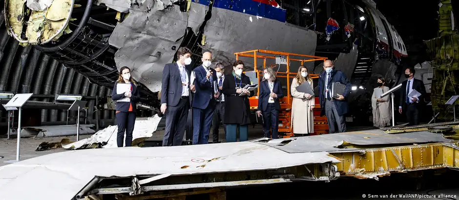 Members of the a Dutch court observe the reconstruction of crashed flight MH17 as part of a trial in May 2021