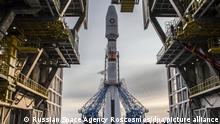 6528088 26.04.2021 In this handout photo released by Russian Space Agency Roscosmos, the Soyuz-2.1b rocket booster with the Fregat upper stage and 36 UK OneWeb communications satellites is seen at the launchpad ahead of its upcoming launch at the Vostochny Cosmodrome, Amur region, Russia. The current OneWeb mission is named after Soviet cosmonaut Yuri Gagarin, the first man in space who made his pioneering flight 60 years ago. Editorial use only, no archive, no commercial use. Russian Space Agency Roscosmos