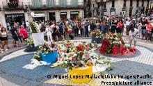 Relatives of victims of Barcelona and Cambrils terror attacks lay a floral tribute at Las Ramblas on August 17, 2018 in Barcelona, Spain. The Barcelona City Council organized a ceremony in memory of the victims of the Barcelona and Cambrils attacks where 16 people where killed and more than 150 injured. (Photo by Miguel Lopez Mallach / Ukko Images / Pacific Press)