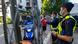 Police talk with local residents in Cheras, Malaysia, following a coronavirus outbreak there Police talk with local residents in Cheras, Malaysia, following a coronavirus outbreak there