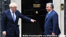 British Prime Minister Boris Johnson, left, welcomes Hungarian President Viktor Orban, at 10 Downing Street, London, Friday, May 28, 2021. Boris Johnson is meeting Friday with Hungarian President Viktor Orban, amid criticism of the decision to invite the hardline European leader to 10 Downing St. Johnson’s office said it was a routine meeting with the leader of a major European Union nation. (Stefan Rousseau/PA via AP)