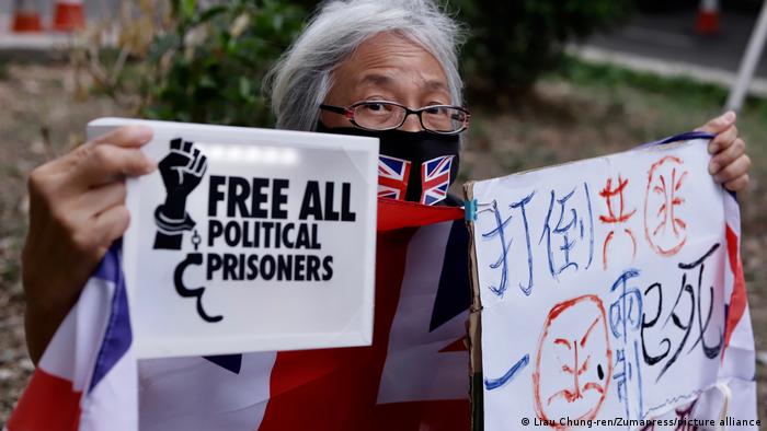 Hong Kong protester Alexandra Wong, pictured on April 16, protesting outside a courtroom.