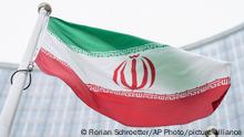 The flag of Iran is seen in front of the building of the IAEA Headquarters after Director General of International Atomic Energy Agency, IAEA, Rafael Mariano Grossi from Argentina, addressed the media regarding the agency's monitoring of Irans's nuclear energy program at the International Center in Vienna, Austria, Monday, May 24, 2021. (AP Photo/Florian Schroetter)