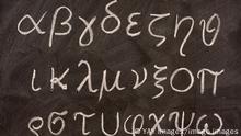 Greek alphabet on blackboard twenty four letters of Greek alphabet from alpha to omega in lower case handwritten with white chalk on a blackboard PUBLICATIONxINxGERxSUIxAUTxONLY Copyright: xPixelsAwayx 682067