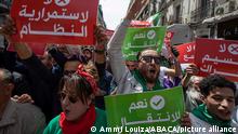 Demonstration of the 112th Friday in Algeria. The demonstrators of Hirak, a popular protest movement born on February 22, 2019 marched on Friday in the streets of Algiers to reiterate their refusal to the early legislative elections of June 12 and demand the independence of the judiciary as well as the release of the Hirak detainees. Algerian protesters raise a national flag as they march demanding political change in the capital Algiers, Algeria, on April 9, 2021. Photo by Louiza Ammi/ABACAPRESS.COM