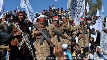 TOPSHOT - Afghan Taliban militants and villagers attend a gathering as they celebrate the peace deal and their victory in the Afghan conflict on US in Afghanistan, in Alingar district of Laghman Province on March 2, 2020. - The Taliban said on March 2 they were resuming offensive operations against Afghan security forces, ending the partial truce that preceded the signing of a deal between the insurgents and Washington. (Photo by NOORULLAH SHIRZADA / AFP) (Photo by NOORULLAH SHIRZADA/AFP via Getty Images)
x