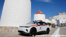 A Volkswagen ID.4 electric cars is seen during a delivery ceremony of service cars and chargers to the police and the port authority of the island of Astypalea, Greece, June 2, 2021. Alexandros Vlachos/Pool via REUTERS